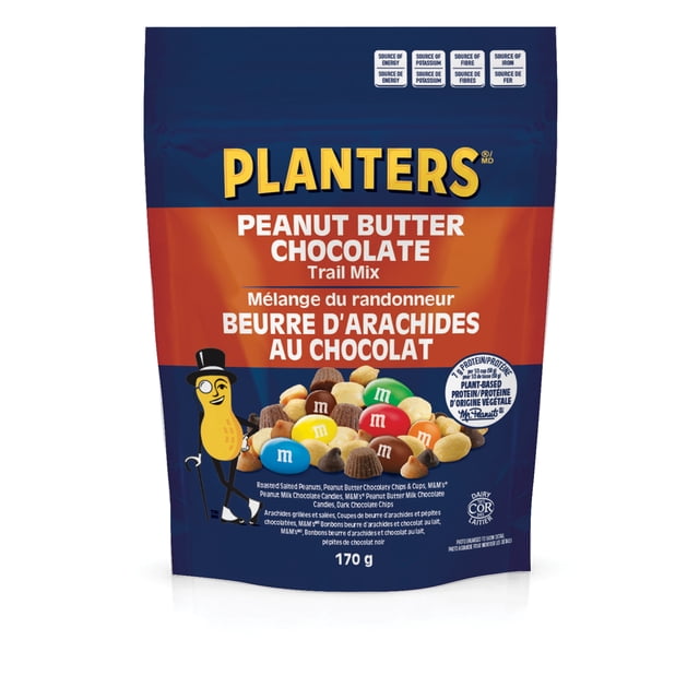 Planters Peanut Butter Chocolate Trail Mix 170g resealable pouch with blue and orange design, featuring roasted salted peanuts, peanut butter chocolaty chips and cups, peanut butter M&M's, and dark chocolate chips. The packaging notes plant-based protein and sources of energy, potassium, fibre, and iron, ideal for a convenient, protein-packed snack.