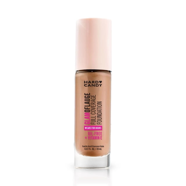 Hard Candy Glamoflauge Full Coverage Foundation in a clear glass bottle with a pale pink cap, featuring black and pink text that highlights its oil-free, vitamin E formula and 20 mL volume, providing lightweight, transfer-proof medium coverage with a matte finish for all-day wear.