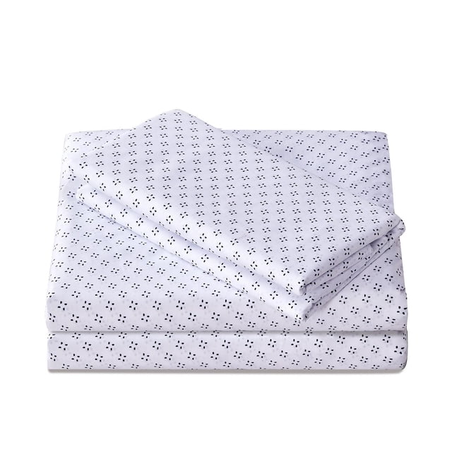 Mainstays Soft, Easy Care, Microfiber Sheet Set – Printed with a folded white microfiber sheet set featuring a small black geometric pattern, including a deep pocket fitted sheet for mattresses up to 14 inches, wrinkle resistant and machine washable, often used to refresh guest rooms or everyday bedding.
