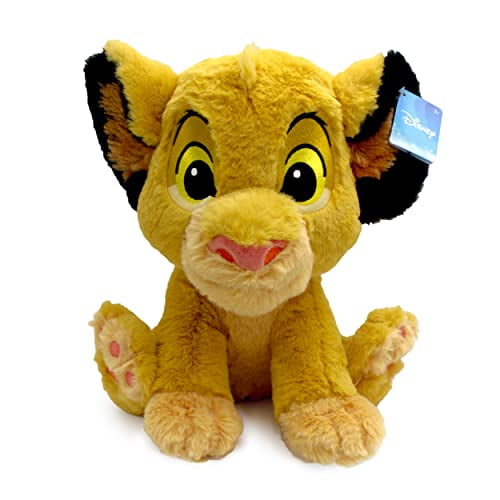 DISNEY Jouet en Peluche Doux SIMBA Montrant SIMBA comme un Toutou de Le Roi Lion, Fait de Fausse Fourrure à Longs Poils Jaune Doré Doux, Yeux Brodés, Nez à Boutons Rose, Oreilles à Bout Noir avec Étiquette DISNEY, Assis Droit sur un Fond Blanc, Convient comme Compagnon Câlin Ou Peluche de Collection.