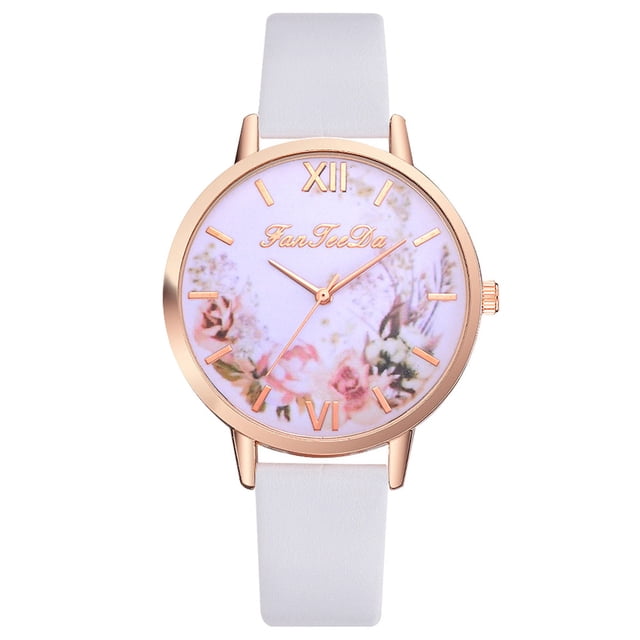 RKSTN Montres pour Femmes FanFeeDa Décontractée Mode Montre à Quartz avec Bracelet Doté d'Un Boîtier Rond en Alliage Or rose avec un Cadran à Motif Floral et des Marqueurs à Chiffres Romains. la Montre Dispose d'Un Affichage Analogique et d'Un Bracelet en Cuir Blanc au design Mince pour le Confort. Convient aux occasions Décontractées et Formelles, Cette Élégante Montre pour Femme Allie style et Fonctionnalité.