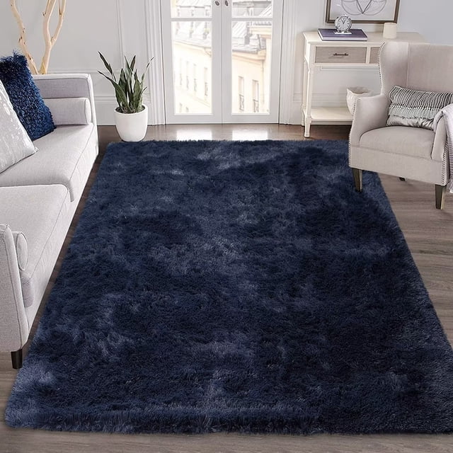 Shag Area Rug Furry Shaggy 8x10 feet Extra Large Fluffy Shag Rugs Carpet Shag Rug for Living Room Bedroom Home Decor, Dark Navy Blue. This ultra-soft rug features a 1.57-inch high velvet pile and a 12mm sponge layer for superior comfort. It includes a non-slip rubber backing with grip dots for safety, making it ideal for kids' play areas. The dark navy blue color enhances the decor of living rooms, bedrooms, or children's spaces.