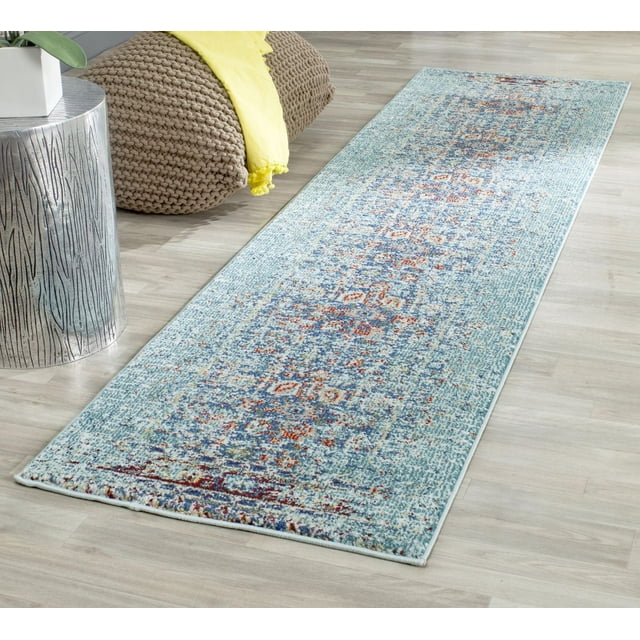 Safavieh Monaco Annabelle Tapis Vintage pour Aire avec un Motif Persan Vieilli en accents Bleu Pâle et Multicolores, Polypropylène Tissé Mécaniquement avec pile à Boucles Haute et Basse Mixte, Exposé sur un Plancher de Bois Clair Près d'Un pouf Tricoté et d'Une table d'Appoint Métallique, Idéal pour Ajouter un style Bohème Chic aux Intérieurs de la Maison.