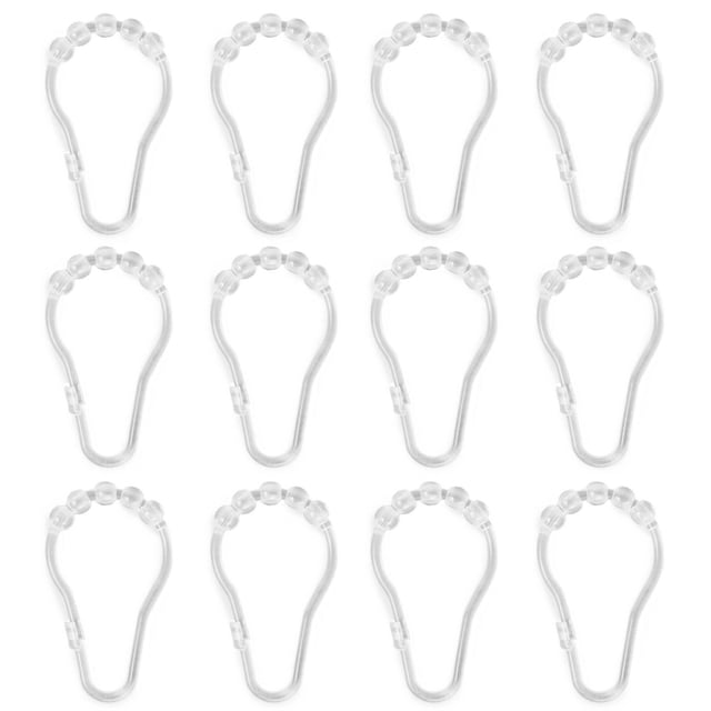 Mainstays Plastic Glide Shower Hooks, Clear, Set of 12, displayed in a 3 by 4 grid on a white background. Each clear plastic hook has five glide beads for smooth movement along any shower rod. These durable hooks securely hold shower curtains and liners, are easy to clean with a damp cloth, and fit most standard curtain holes. They are also suitable for hanging lightweight bathroom accessories.