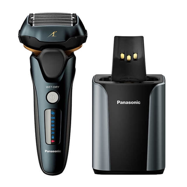 Panasonic 5-blade Multi-Flex Pro Shaver with Cleaning Station displayed in a front-facing view. The shaver features a black and gold design, digital display, and wet/dry functionality. Includes a foil shaving system and an automatic cleaning and charging station, ideal for men's grooming.