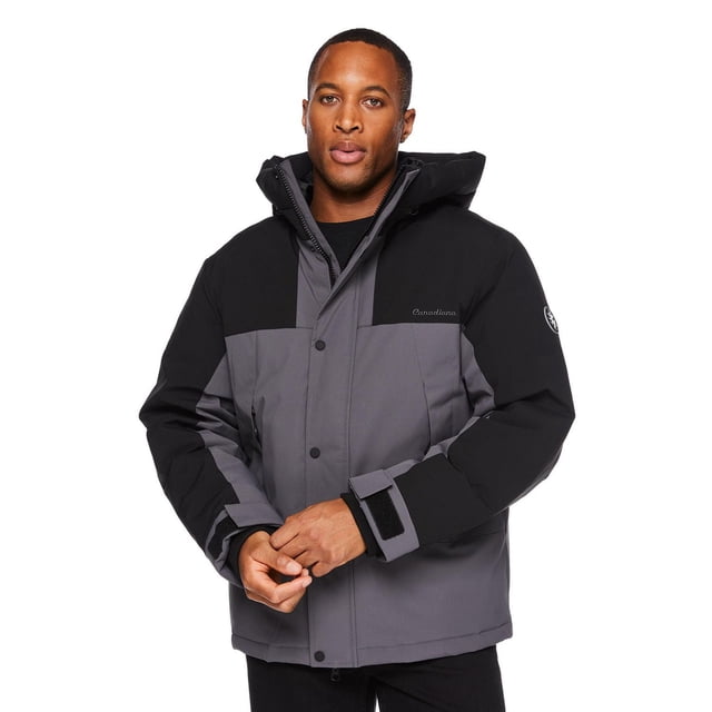 Canadiana x RCGS men's down parka in grey and black water-repellent recycled polyester with down-blend fill, featuring a hood with drawcords, full-zip closure with storm placket, adjustable hook and loop strap cuffs, storm cuffs, and two zippered pockets, suitable for cold Canadian weather.