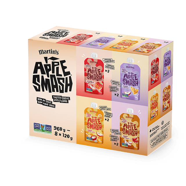 Appke Smash Variety Pack 8pk with eight 120g pouches of fruit puree in four flavours: smashed honeycrisp apple, smashed apple pie, smashed apple with oats, and smashed apple with maple. The packaging features non-GMO verification, gluten free, and no preservatives labels in English and French.