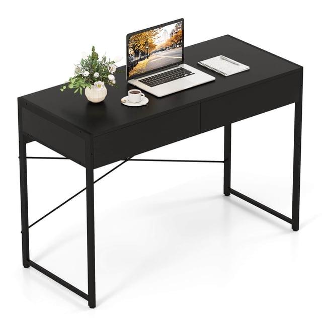 Costway Modern 2-Drawer Computer Desk with Reinforced Heavy-Duty Metal Frame and Anti-Tip Kit. This black desk features a spacious tabletop, two pull-out drawers for storage, and an X-shaped bracket for stability. The heavy-duty metal frame supports up to 250 lbs, and adjustable foot pads ensure balance on uneven surfaces. Ideal for use as a writing desk, study desk, or laptop desk, it blends seamlessly with modern home styles.