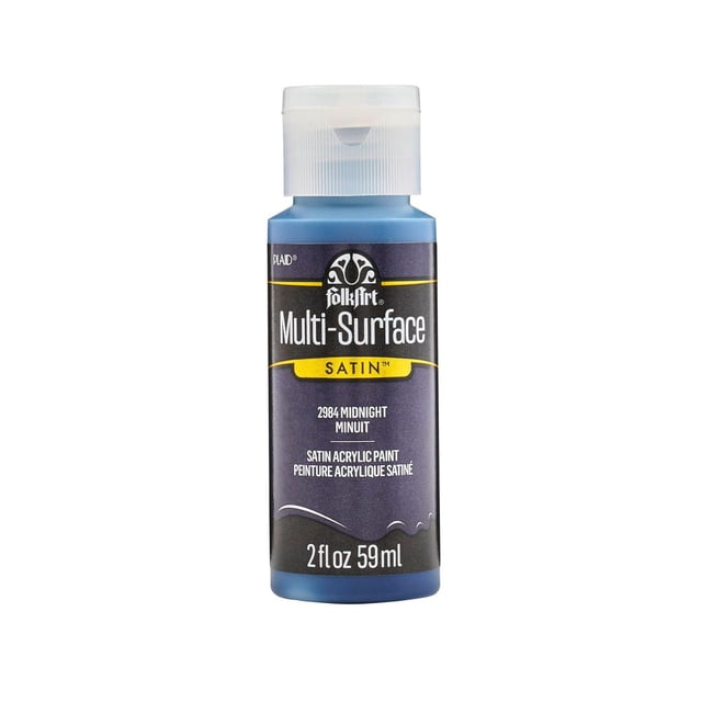FolkArt Multi-Surface Satin Acrylic Paint 2 fl. oz. bottle in midnight blue with satin finish, ideal for craft projects on wood, canvas, glass, fabric, and ceramics, featuring a clear flip-top cap and labeled with product details in white and yellow text, suitable for indoor and outdoor use.
