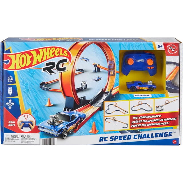 Hot Wheels RC Speed Challenge Track Set includes 30+ multicolour track pieces and a 1:64 scale blue remote-control car named Rodger Dodger with flame decals and exposed engine, plus a blue battery-powered remote with orange joysticks. Designed for kids 5+, it offers over 100 track configurations with loops and stunts, operating on a 2.4 GHz frequency with a 25m (80ft) range for interference-free racing.
