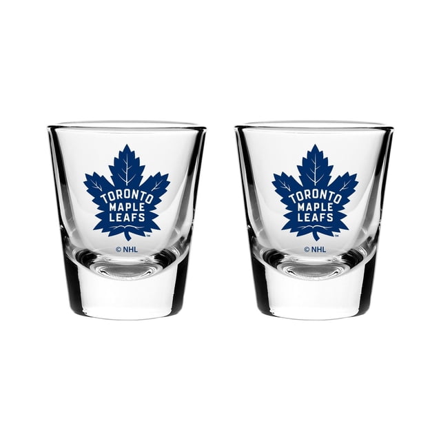 The Sports Vault Ensemble de 2 Verres à Shooter Maple Leafs de Toronto avec Deux Verres à Shooter en Verre Transparents de 2 Oz Présentant le logo Maple Leafs de Toronto Bleu, Faits de Verre 100 % et Compatibles Lave-Vaisselle, Convient comme Vaisselle de Bar Ou comme Cadeau pour les Amateurs de hockey.