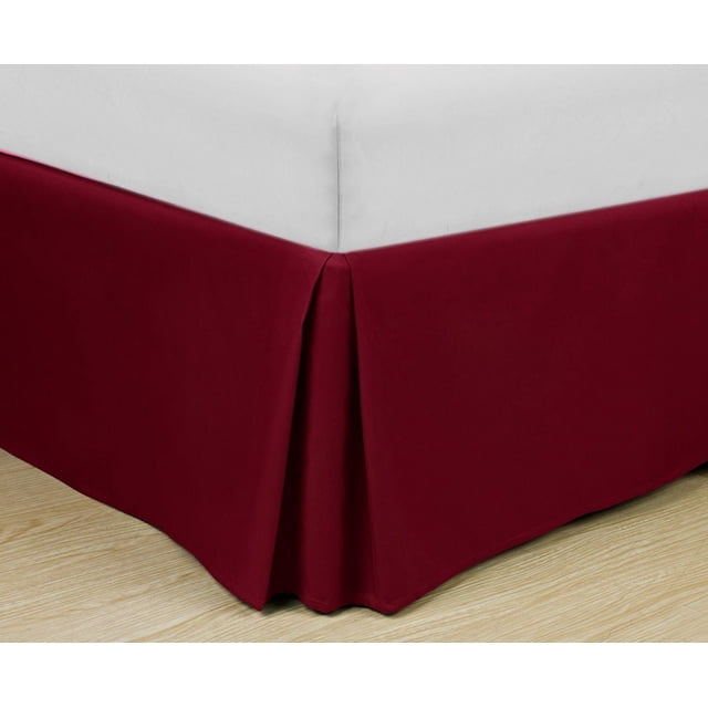 Super Soft Microfiber Bed Skirt in deep red with tailored box pleat design, fitted on a bed corner with white mattress cover, resting on light wood flooring, made from wrinkle-resistant microfiber for durability and smooth finish, ideal for enhancing bedroom decor.
