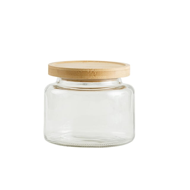 Mainstays Glass Kitchen Food Storage Jar 1.5L clear glass jar with a round bamboo lid featuring an airtight seal, designed for kitchen organization and storing dry or wet foods like pasta, rice, or coffee beans, also suitable for pantry or fridge use.
