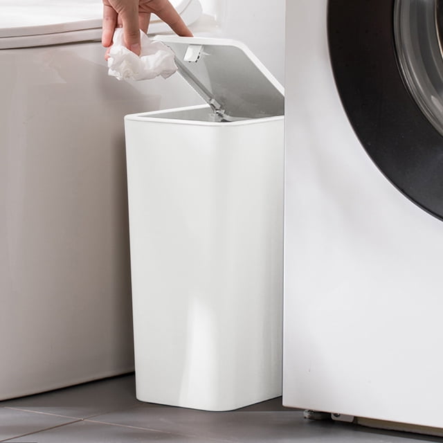 Dvkptbk Kitchen Accessories Trash Can Bathroom Trash Can with Lid, a compact white plastic garbage bin with a press popup lid, placed between a toilet and washing machine. Suitable for bathrooms, offices, bedrooms, and living rooms, it features a narrow design and odor-locking lid for efficient waste management.