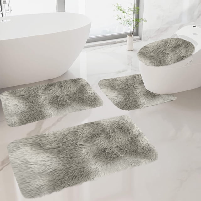 Ycandiee Bathroom Mat Set, a 4-piece bathroom rug set in grey, featuring soft absorbent microfiber bath mats and a U-shaped contour toilet rug. The mats have a plush shaggy texture, non-slip backing, and are machine washable. Displayed in a modern bathroom setting with a white bathtub and toilet.