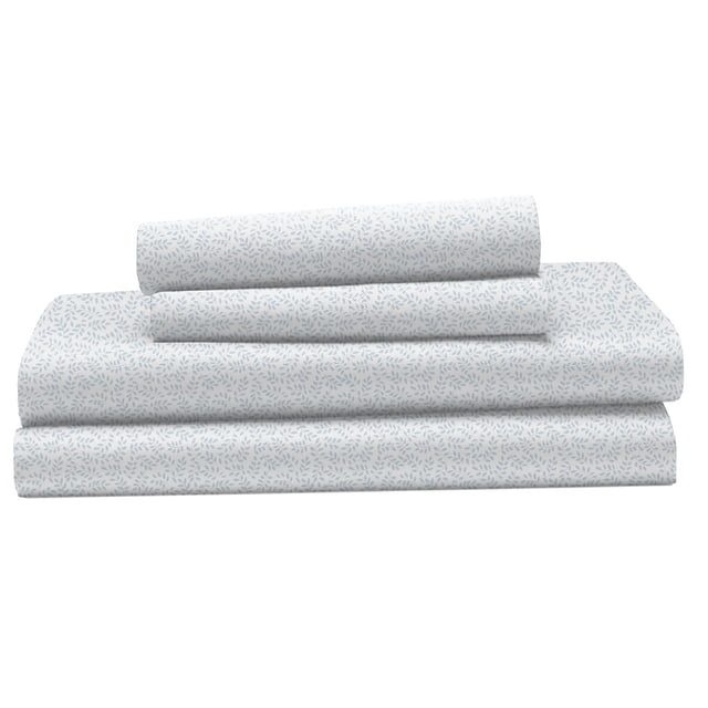 Hometrends 400 thread count 100% cotton sheet set featuring a white base with a light blue leaf pattern, neatly folded to show flat sheet, fitted sheet, and pillowcases made from breathable sateen fabric that is wrinkle and fade resistant, suitable for bedroom décor.