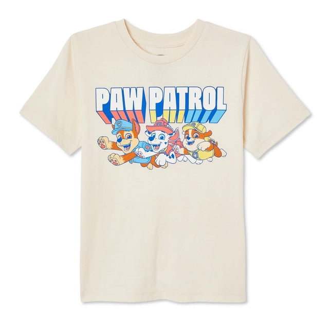 Paw Patrol boys' short sleeve tee in cream with a crew neckline, made of cotton-rich jersey knit, featuring a front graphic print of three Paw Patrol characters beneath bold 'PAW PATROL' text in blue, red, and yellow block letters, ideal as a boys' graphic t-shirt for casual wear.