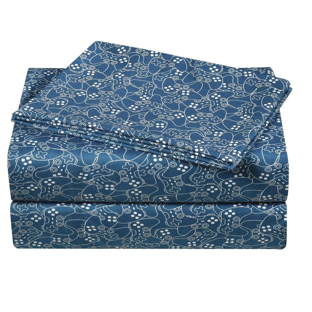Mainstays Kids Printed Easy Wash Soft-Microfiber Sheet Set in blue with white outlined video game controller pattern, folded to show flat sheet, fitted sheet, and pillowcases made of 100% polyester microfiber, wrinkle resistant and machine washable, ideal for kids' bedding.