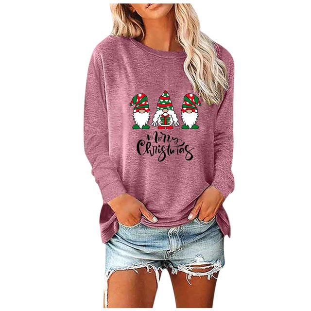 Womens Round-Neck Christmas Printing Recreational Long Sleeve Tops designed for casual wear. This holiday top features a festive print of three gnomes in red and green hats with the text 'Merry Christmas' on the front. Made of lightweight, breathable polyester fabric, it has a round neckline, long sleeves, and a hip-covering length. Shown in a muted red color paired with denim shorts, ideal for holiday gatherings or daily wear.