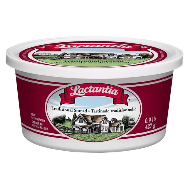 Lactantia Traditional Margarine Spread in a white plastic tub with a maroon label featuring a farmhouse illustration and the Lactantia logo, containing 0.9 lb (427 g) of smooth, spreadable cultured butter margarine suitable for dairy spreads and baking.