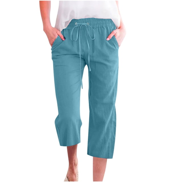 Women Casual Capris Straight Leg Drawstring Elastic Waist Linen Pants with Pockets in a solid light blue color. These lightweight, breathable pants feature an elastic waistband with a drawstring, straight wide legs, and functional side pockets. Made from a cotton-linen blend, they are ideal for spring, summer, and fall wear. Suitable for casual outings, lounging, yoga, or beachwear.