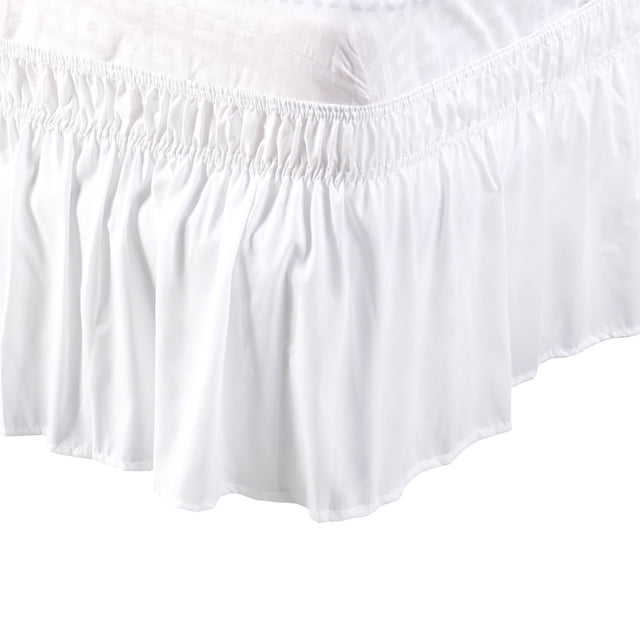 Unique Bargains Polyester Bed Skirt Elastic Wrap Around Dust Ruffle with a 15-inch drop, shown in a snow white color. Made of 100% polyester, this bed skirt features a gathered design with an elastic band for easy installation and removal. Suitable for queen-size beds measuring 60 inches by 80 inches. The fabric is dust-resistant, wrinkle-free, and machine washable, offering a clean and polished look to conceal box springs or under-bed storage.