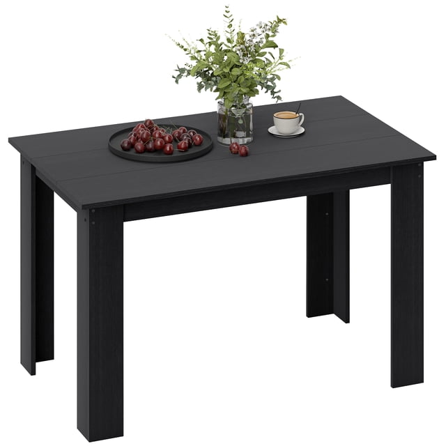 HOMCOM table à Manger Moderne de 47 Pouces avec une Finition Effet Bois Noire Élégante, Présentant une surface Rectangulaire Soutenue par des Pieds Triangulaires Robustes. Fabriquée en Panneau de Particules durable, Elle Peut Accueillir 4 à 6 Personnes et s'Insère de Façon Compacte dans les Petites Cuisines Ou les Espaces de Repas. Décorée d'Un Plateau de Raisins, d'Une Tasse de Café et d'Un vase de Verdure, Elle Convient Aussi comme Espace de Travail pour les Petits Appartements.