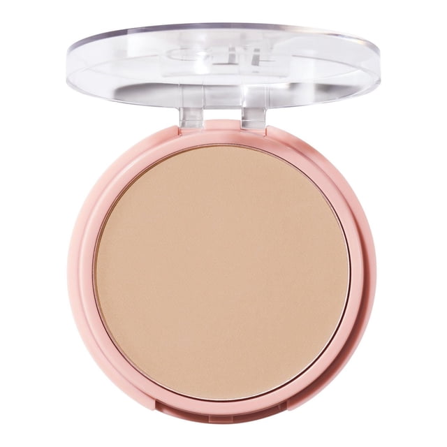 e.l.f. Cosmetics Halo Glow Powder Filter in a round pink compact with a clear lid, showing a light beige ultra-fine pressed powder that blurs pores and reduces shine for a soft-focus, airbrushed finish, suitable for setting and refreshing makeup on the go.