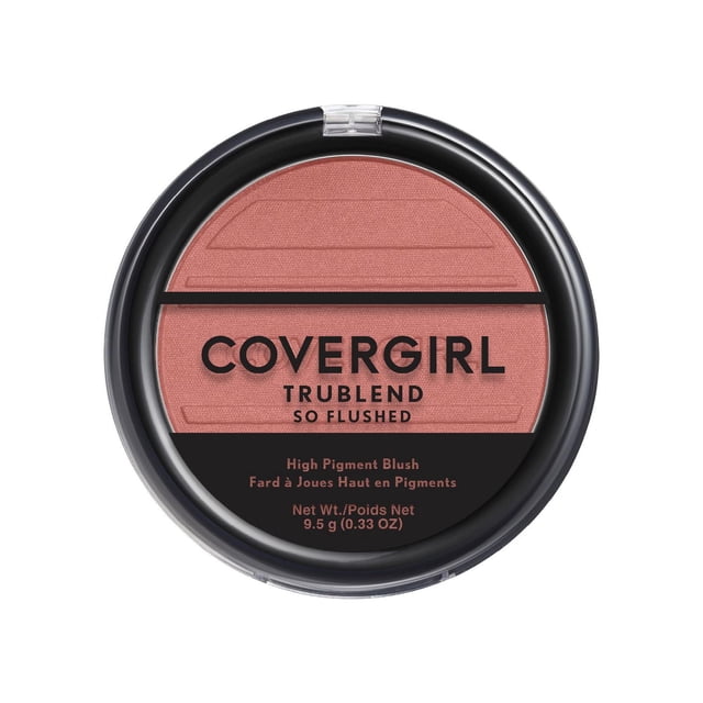 COVERGIRL TruBlend So Flushed High Pigment Blush and Bronzer in a round black compact with clear lid, showing warm pink powder blush inside, labeled with brand and product details including 9.5 g (0.33 oz) net weight, suitable for blendable, buildable cheek color.