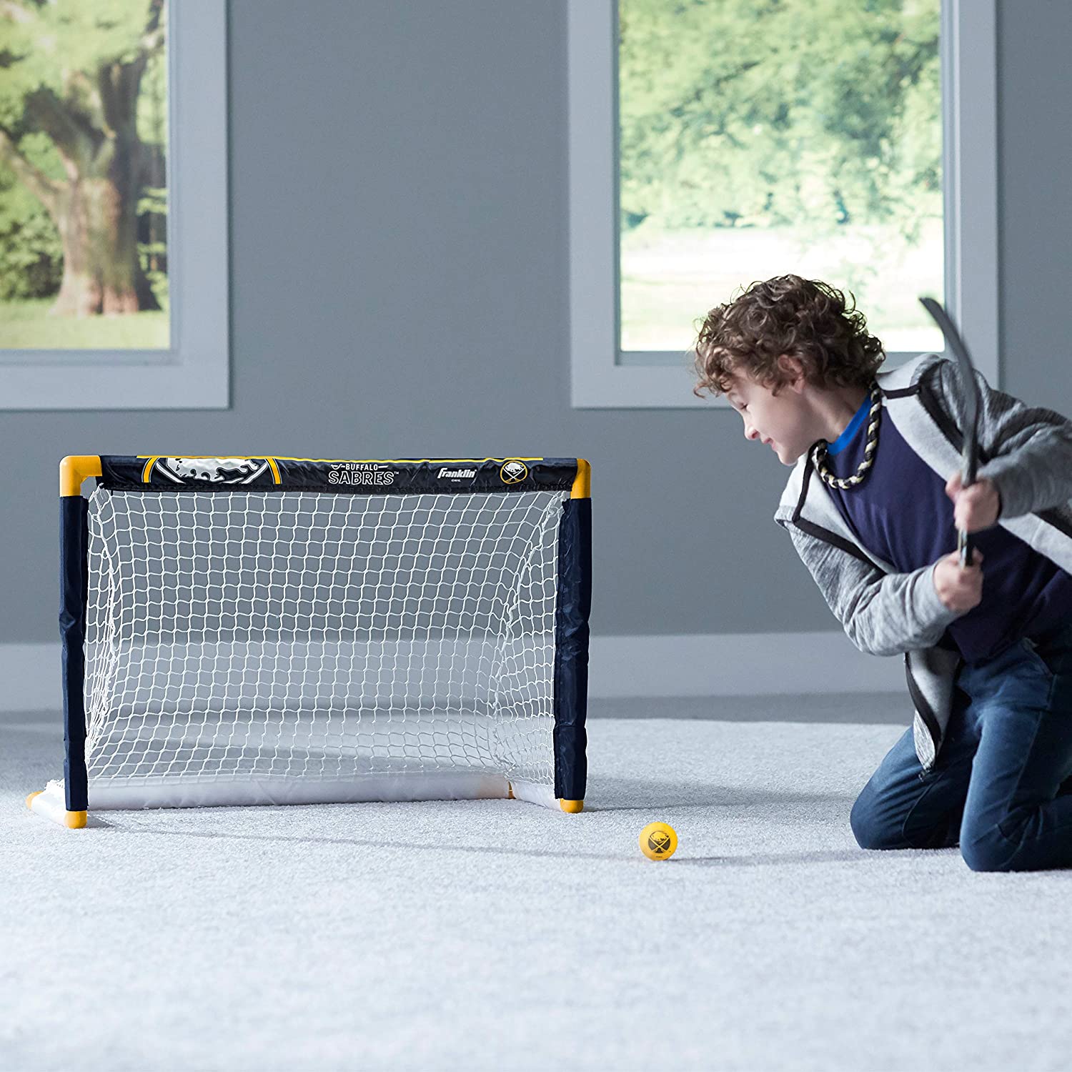 Franklin Sports Ensemble de mini hockey Sabres de la NHL – But de hockey intérieur pour enfants, ballon, 2 mini bâtons de hockey