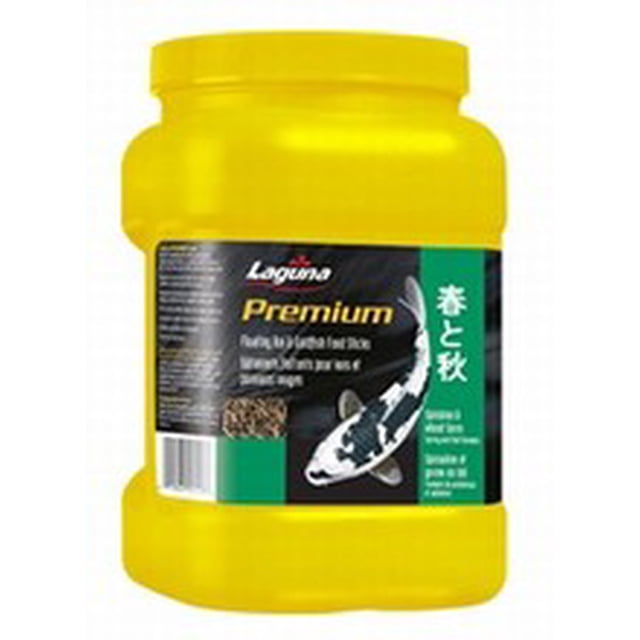 Laguna Formule de Printemps et d'Automne 300 g (2 Litres) dans un Contenant Jaune Vif avec une Étiquette Noire Présentant un Graphique de Poisson koi. Cette Formule Bâtonnière Flottante de Qualité Supérieure pour Carpes Koï et Poissons Rouges Comprend du Germe de Blé, du Varech, de la Spiruline, de la Farine de Poisson Blanc, du krill et des Vitamines pour Favoriser la Résistance aux Maladies, la Croissance, des Couleurs Vibrantes et la digestion. Convient aux Poissons d'Étang Lorsque la Température de l'Eau Est Supérieure à 8 °C