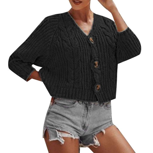 Baberdicy Cardigan Sweater Ladies Solid Color Button Sweater Knit Cropped Loose Cardigan in black. This women's cardigan features a relaxed fit with a cable-knit texture, long sleeves, and button closures. Made of cotton, it is designed for casual chic style and is suitable for various occasions such as daily wear, work, or outings. The cropped length and baggy fit add a modern touch, while the reinforced seams provide durability. Shown paired with distressed denim shorts.
