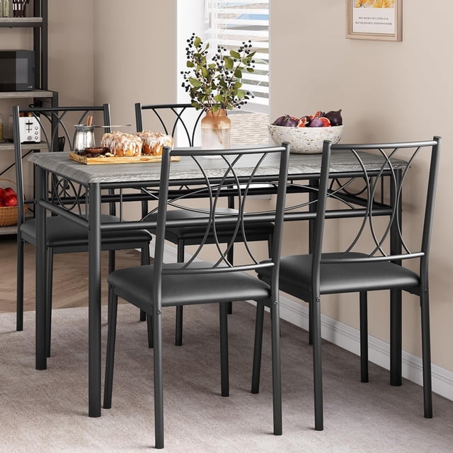 Dining Table Set for 4, a 5-piece kitchen furniture set with a retro gray rectangular MDF tabletop and four upholstered chairs with black metal frames. Designed for small spaces like apartments or studios, the chairs can be tucked under the table for space-saving convenience. Perfect for dining rooms or kitchens, shown in a neutral-toned dining area.