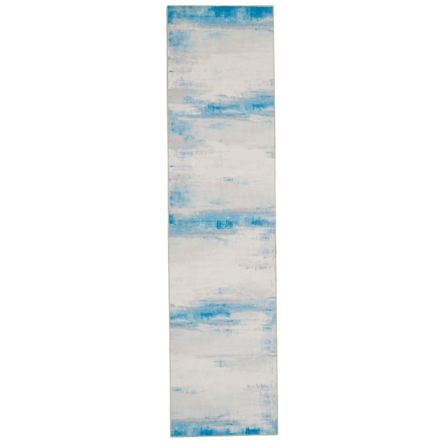 Tiana 2' x 8' washable runner in ivory and blue with an abstract brushstroke pattern, made of stain-resistant polyester with nonslip backing, ideal for high-traffic areas like kitchens and hallways, and machine washable for easy maintenance.