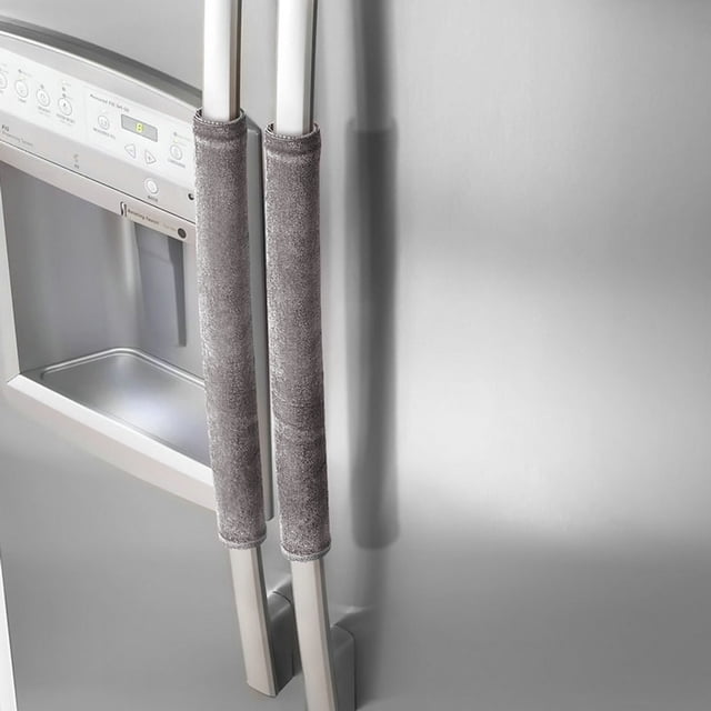 Vaidha A Pair Refrigerator Handle Cover in grey, a refrigerator accessory designed to protect appliance handles from stains, fingerprints, and temperature extremes. These handle protectors are adjustable, washable, and suitable for various kitchen appliances like refrigerators, microwaves, ovens, and dishwashers. Made of cloth material, each cover measures 40 cm in length and 12 cm in width.