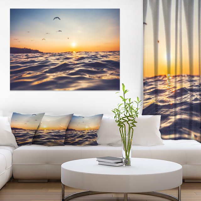 Orange Tinged Sea Waters at Sunrise - Beach Photo Canvas Print
