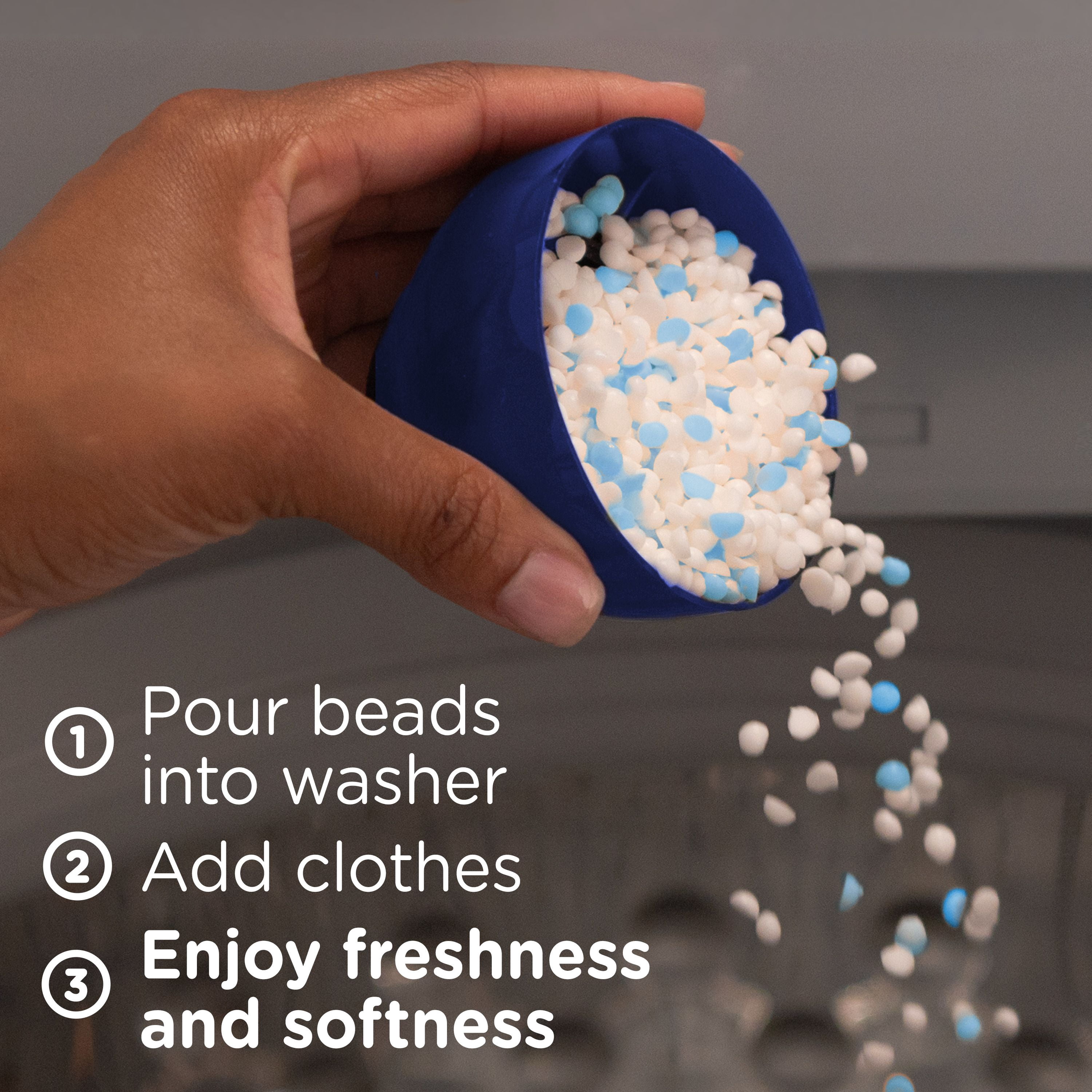Perles rehausse-parfum pour lessive Downy Confort et bien-être, parfum Pluie de prairie, Douceur et fraîcheur