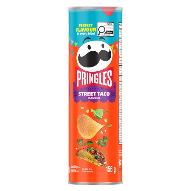 PRG CA ST TACOS PTO CHIPS 156GM Pringles Street Taco flavour potato chips in a 156-gram cylindrical can with orange and blue packaging, featuring the Pringles mustached logo, images of a chip, lime wedge, cilantro, and taco, with a Health Canada sodium warning label, often enjoyed as a bold snack option.