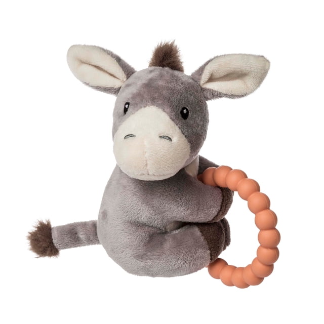 Mery Meyer - Teether Rattle - Dusty Donkey, a plush dove brown donkey with soft fabric, large ears, a fluffy mane, and sweet embroidered eyes. The donkey holds a peach-colored beaded teether ring, offering sensory stimulation and crinkle activity. Perfect as a baby rattle and infant toy for toddlers.