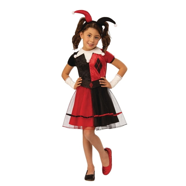 Harley Quinn Child Costume with a red and black split dress featuring diamond patterns, a white jester collar with pom-poms, matching red and black jester hat headpiece, white wrist gauntlets, and glittery mismatched red and black flats, ideal for Halloween superhero celebrations.