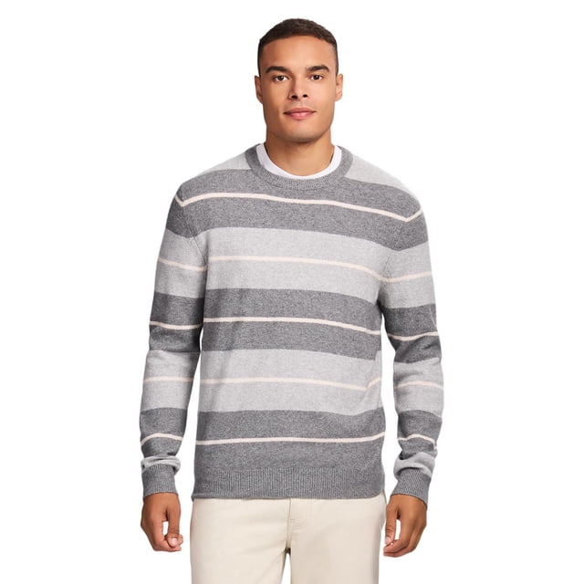 IZOD Crewneck Sweater in grey featuring alternating light and dark horizontal stripes with thin white lines, classic fit with ribbed crew neckline, cuffs, and hem, made from soft stretch cotton blend fabric, styled with beige pants on a white background.
