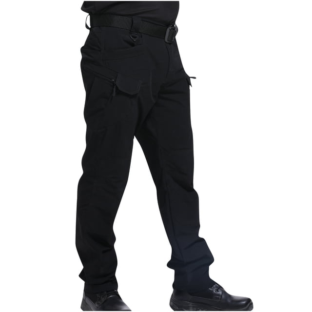 Aqestyerly Men's Cargo Pants Multi Pocket Workwear Combat Style Outdoor Utility Trousers Functional Pants HWRETIE. These black cargo pants feature multiple spacious pockets, a durable polyester-cotton blend, and a regular fit. Designed for casual and workwear use, they are suitable for all seasons and provide comfort and functionality. The pants are shown with a belt and paired with black shoes.
