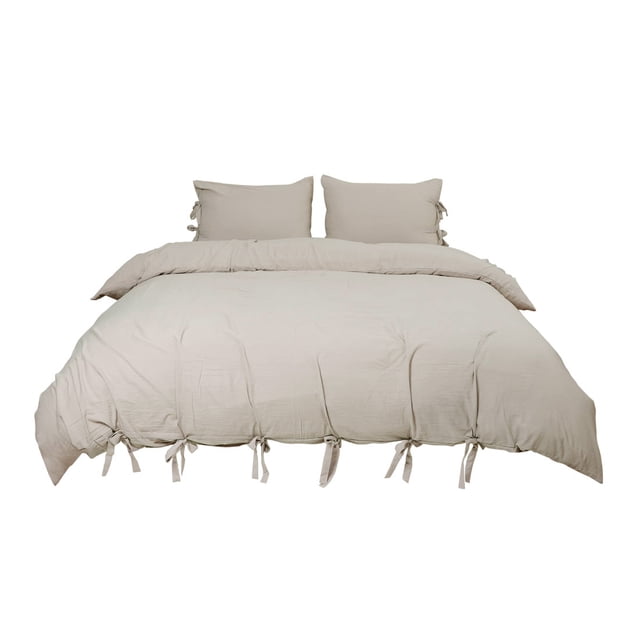 Washed Cotton Bedding Set Comforter Duvet Cover Pillowcase Tan Queen. This set includes a tan queen-size duvet cover (90" x 90") and two standard pillowcases (20" x 26"). Made from 100% microfiber polyester with stone-washed technology, it offers a soft, breathable, and wrinkle-resistant texture. Features bowknot ties closure and four corner ties to secure the comforter. The strap design adds a modern touch, suitable for both traditional and contemporary bedroom styles. Machine washable for easy care.