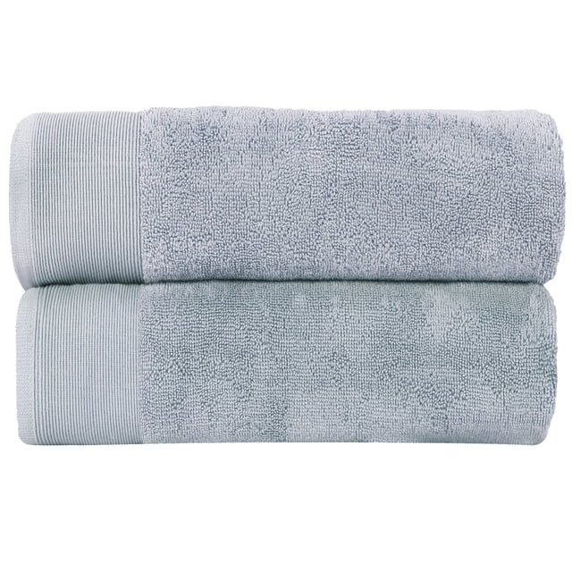 Fabstyles Super Soft Bath Sheets 2 Piece Set, Extra Large Bath towels in silver color. Two luxury bath sheets measuring 35x70 inches are stacked neatly, highlighting their plush terry texture and ribbed edges. Made of 100% cotton with a zero-twist construction for hypoallergenic softness, absorbency, and durability.