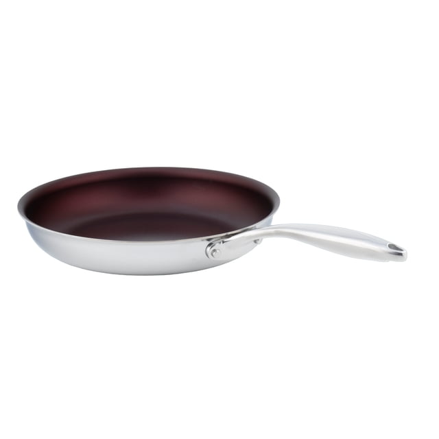 Meyer SuperSteel Tri-Ply Clad Stainless Steel Non-Stick Fry Pan - 24 cm. This Canadian-made fry pan features a tri-ply construction with two layers of 18/10 stainless steel fused to an aluminum core for even heat distribution. It has a PFOA-free non-stick coating, a flared rim for drip-free pouring, and a riveted stainless steel handle. Oven safe up to 500°F (260°C) and compatible with all stovetops, including induction. Dimensions: 24 cm (9.5 inches) diameter, 46.5 cm length, 25.7 cm width, and 7.5 cm height. Weight: 1.05 kg (2.3 lb).