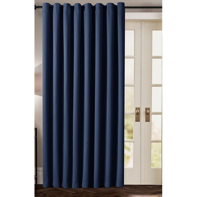 Extra-Wide Patio Door Window Panel in dark navy blue with grommet top hanging on a black rod, covering white French doors with glass panes. This room darkening curtain panel reduces noise, insulates, and is easy care, ideal for back door sliders or French doors.