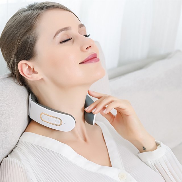 EGNMCR Four And Neck Instrument Neck Electric Neck Instrument Neck massage in white, shown worn around the neck. Features include low-cycle technology for pain relief, constant temperature massage with a 42°C hot compress, and six massage modes with nine intensity adjustments. Made of ABS and stainless steel, it is lightweight and USB rechargeable with a built-in 1000mAh lithium battery. Suitable for home, dorm, or office use.