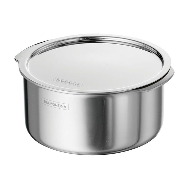 Tramontina Utsava Tri-Ply Clad Stainless Steel Covered Tope Patila shown front-facing with polished mirror-finish stainless steel and a flat lid featuring the Tramontina logo. It has a rounded edge for easy pouring, works on all cooktops including induction, and is oven safe to 500°F. Suitable for warming milk, brewing spiced teas, and simmering broths, with inside quart and liter markings for precise measuring.