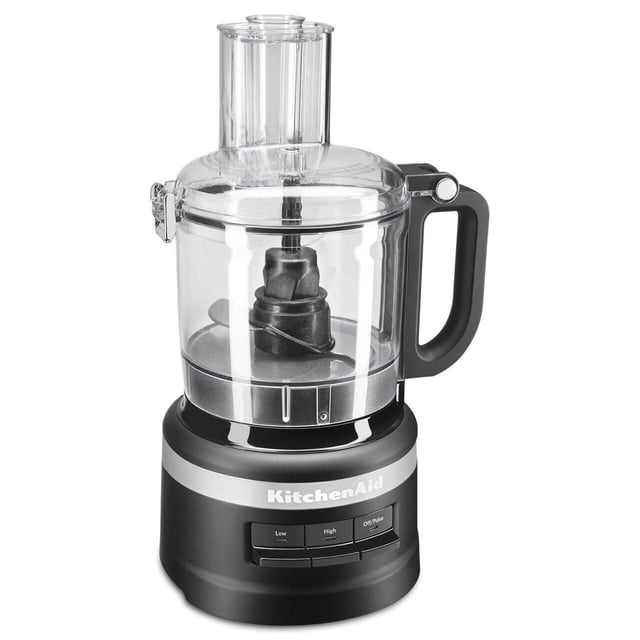 KitchenAid® 7 Cup Food Processor with clear plastic work bowl and lid, black base with Low, High, and Off/Pulse speed buttons, and a black handle, designed for chopping, shredding, slicing, and pureeing with easy-clean snap-and-go assembly and built-in blade storage.