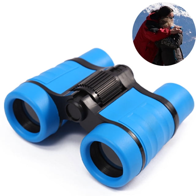 Jumelles pour Enfants, Jumelles pour l'Observation des Oiseaux pour Enfants, Jumelles Haute Résolution de Couleur Bleue Vibrante au design compact et Ergonomique. Parmi les Caractéristiques, Citons un Grossissement 4x, un Diamètre de Sortie de 30 mm pour la Pupille et un Corps en Plastique durable avec des Oeillets en Caoutchouc Souple pour la Sécurité. Imperméables et Antichoc, Ces Jumelles Sont Idéales pour les Activités de Plein Air comme la Randonnée, le camping et l'Observation des Oiseaux. l'Image Montre les Jumelles Placées sur une surface Blanche avec un Encadrement Circulaire